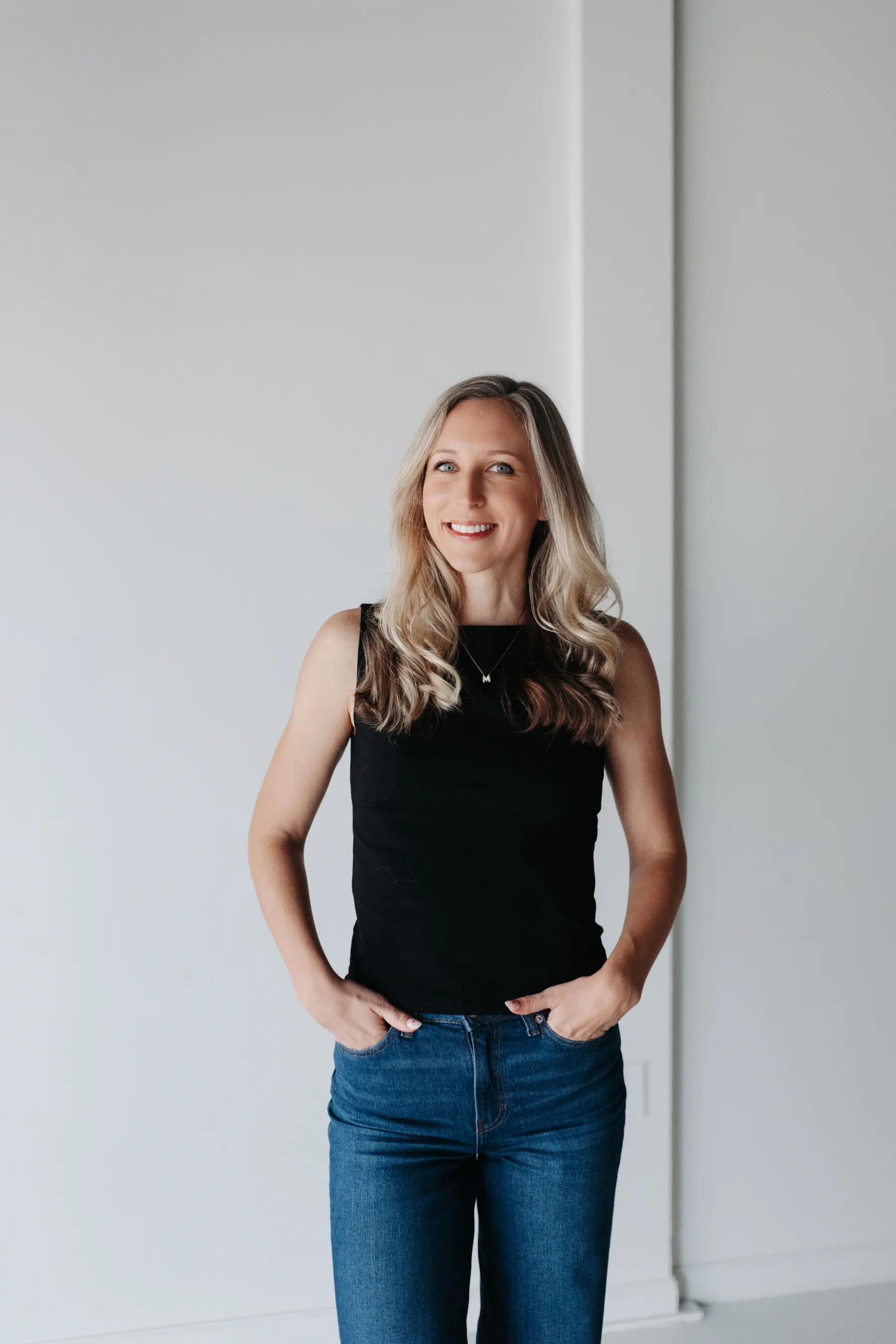 Therapist standing in a calm studio space